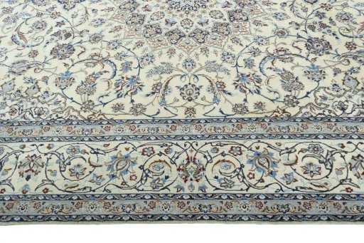 Corner detail of 2000s Nain rug showing border pattern and Cork pile