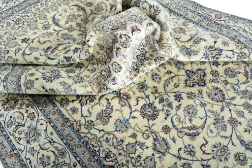 Surface texture of 2000s Nain rug with natural Cork and intricate pattern