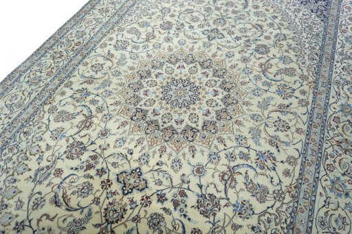 Backside of handmade 2000s Nain rug showing knot structure and weave density