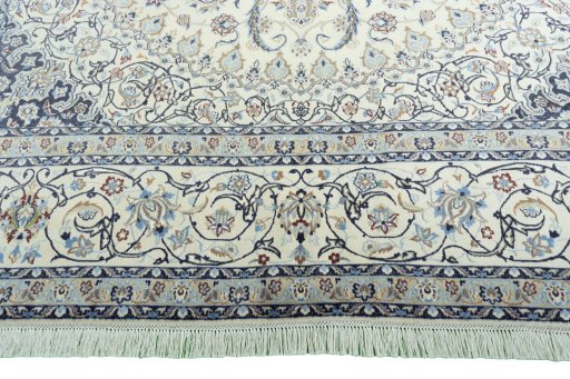 Full view of 2000s Nain rug from Iran / Persia, 330 × 211 cm in Beige tones