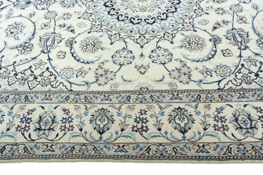 Corner detail of New Nain rug showing border pattern and Wool pile