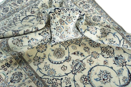 Surface texture of New Nain rug with natural Wool and intricate pattern