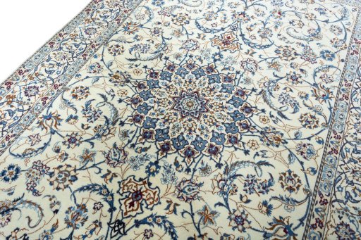 Backside of handmade 2000s Nain rug showing knot structure and weave density