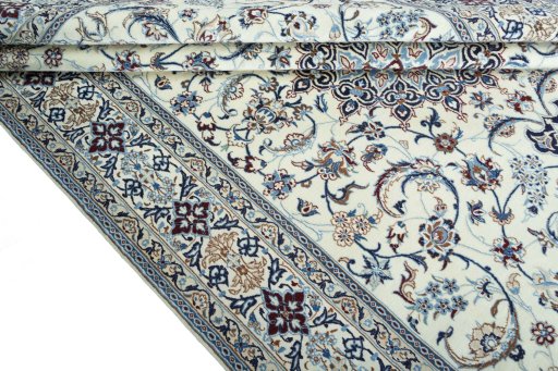 Close-up detail of 2000s Nain rug from Iran / Persia showing Wool weave