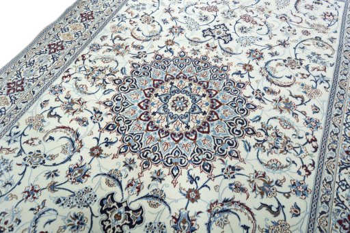 Backside of handmade 2000s Nain rug showing knot structure and weave density