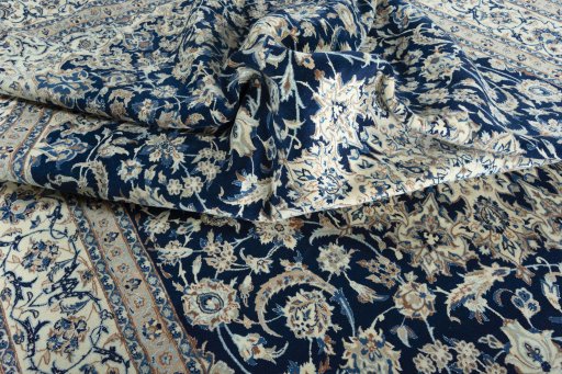 Surface texture of 2000s Nain rug with natural Wool and intricate pattern