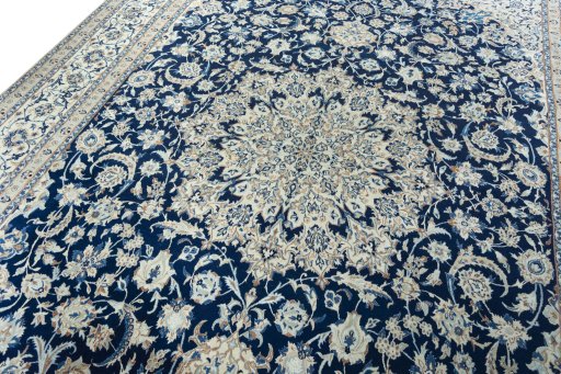 Backside of handmade 2000s Nain rug showing knot structure and weave density