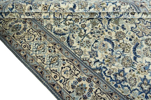 Close-up detail of 2000s Nain rug from Iran / Persia showing Wool weave