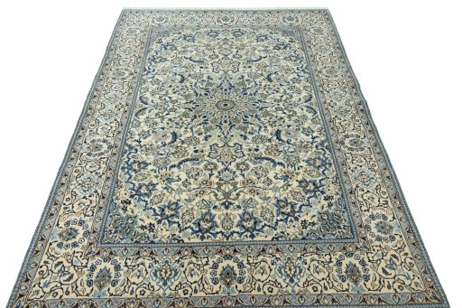 Surface texture of 2000s Nain rug with natural Wool and intricate pattern