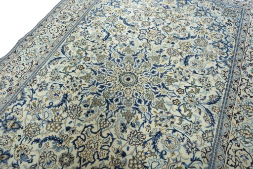 Backside of handmade 2000s Nain rug showing knot structure and weave density