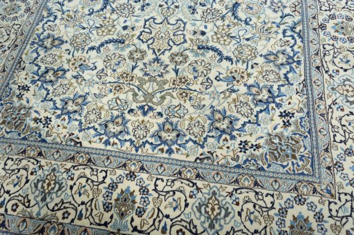 Close-up detail of 2000s Nain rug from Iran / Persia showing Wool weave