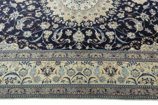 Corner detail of 2000s Nain rug showing border pattern and Cork pile