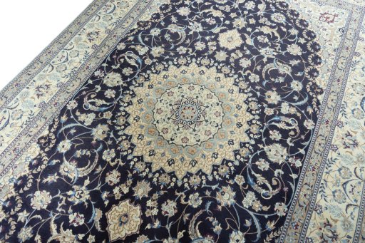 Backside of handmade 2000s Nain rug showing knot structure and weave density
