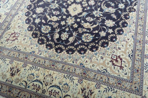 Close-up detail of 2000s Nain rug from Iran / Persia showing Cork weave
