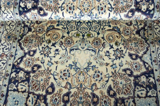 Close-up detail of 2000s Nain rug from Iran / Persia showing Wool weave