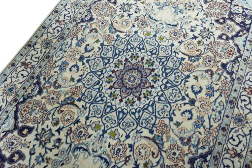 Backside of handmade 2000s Nain rug showing knot structure and weave density