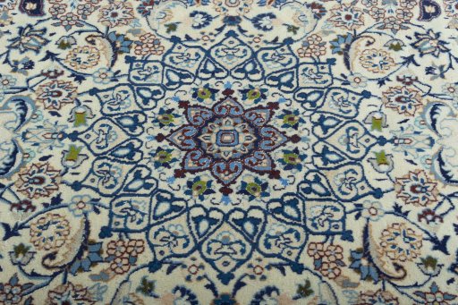 Central medallion detail of 2000s Nain rug from Iran / Persia