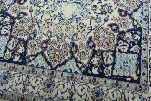 Close-up detail of 2000s Nain rug from Iran / Persia showing Wool weave