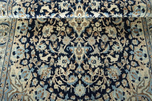 Close-up detail of 2000s Nain rug from Iran / Persia showing Wool weave