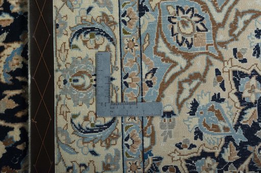 Backside of handmade 2000s Nain rug showing knot structure and weave density