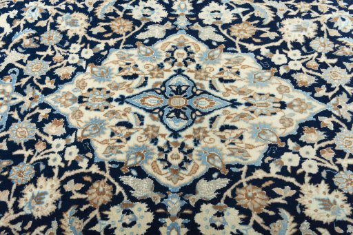 Central medallion detail of 2000s Nain rug from Iran / Persia