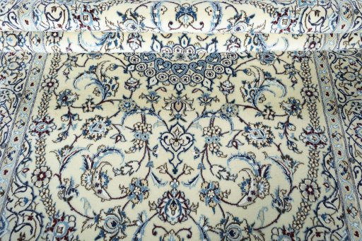 Close-up detail of 2000s Nain rug from Iran / Persia showing Wool weave