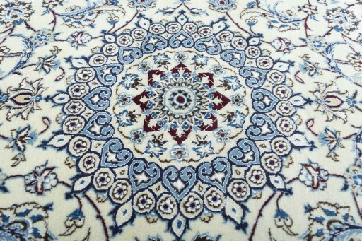 Central medallion detail of 2000s Nain rug from Iran / Persia