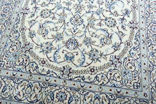 Close-up detail of 2000s Nain rug from Iran / Persia showing Wool weave