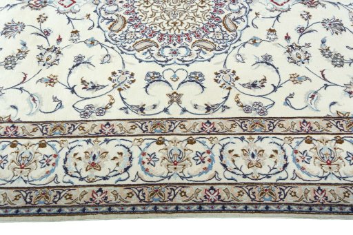 Corner detail of 2000s Nain rug showing border pattern and Wool pile