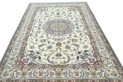 Surface texture of 2000s Nain rug with natural Wool and intricate pattern