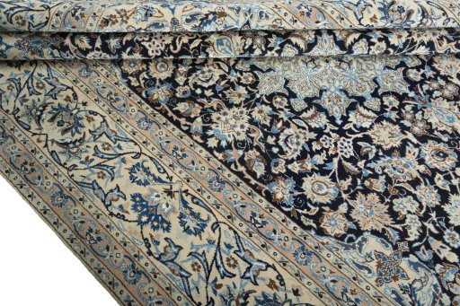 Close-up detail of 2000s Nain rug from Iran / Persia showing Wool weave