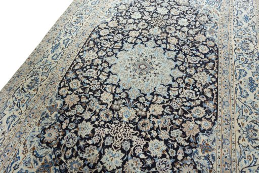 Backside of handmade 2000s Nain rug showing knot structure and weave density