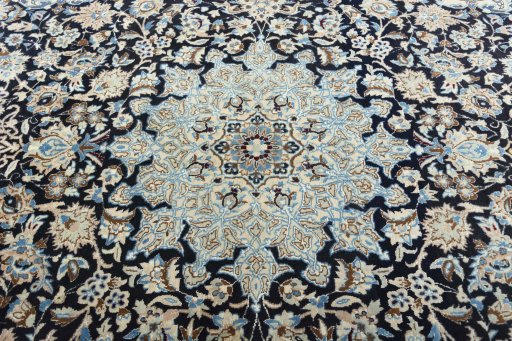 Central medallion detail of 2000s Nain rug from Iran / Persia