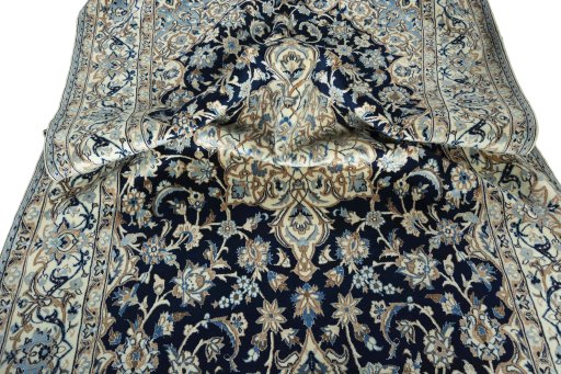 Surface texture of New Nain rug with natural Wool and intricate pattern