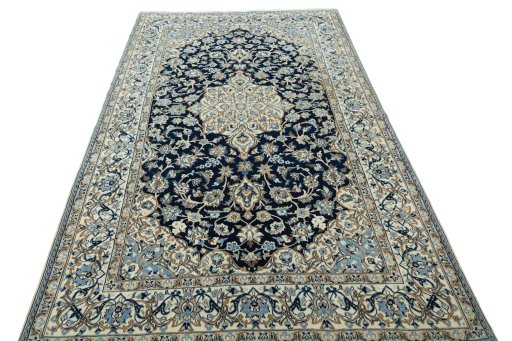 Surface texture of New Nain rug with natural Wool and intricate pattern