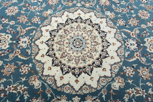 Central medallion detail of New Nain rug from Iran / Persia