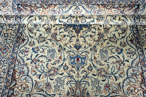 Close-up detail of 2000s Nain rug from Iran / Persia showing Wool weave