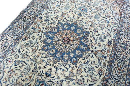 Backside of handmade 2000s Nain rug showing knot structure and weave density