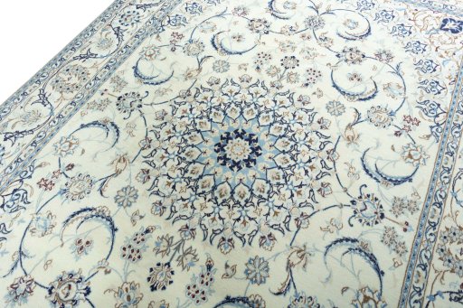 Backside of handmade 2000s Nain rug showing knot structure and weave density