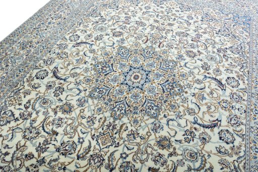 Backside of handmade New Nain rug showing knot structure and weave density