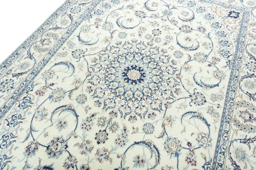 Backside of handmade New Nain rug showing knot structure and weave density