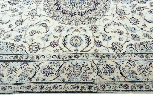 Corner detail of New Nain rug showing border pattern and Wool pile