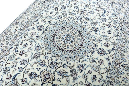 Backside of handmade 2000s Nain rug showing knot structure and weave density