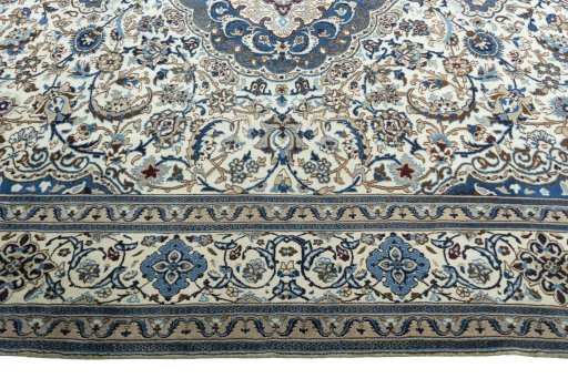 Corner detail of New Nain rug showing border pattern and Wool pile