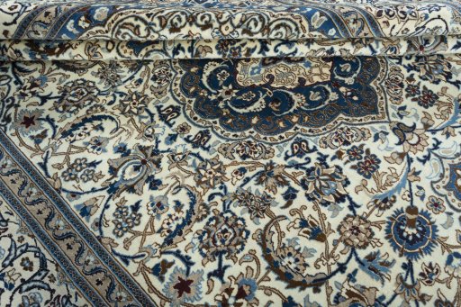 Close-up detail of New Nain rug from Iran / Persia showing Wool weave