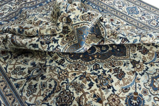 Surface texture of New Nain rug with natural Wool and intricate pattern