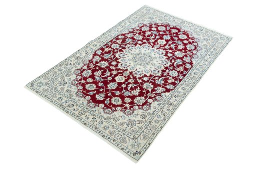 Corner detail of New Nain rug showing border pattern and Wool pile
