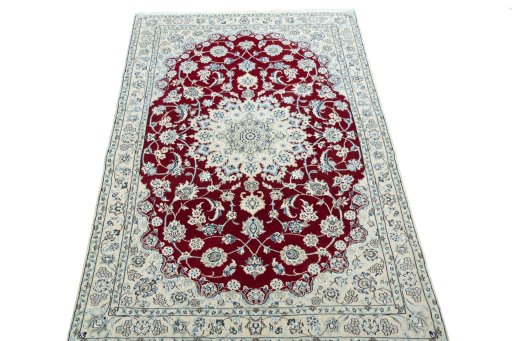 Surface texture of New Nain rug with natural Wool and intricate pattern