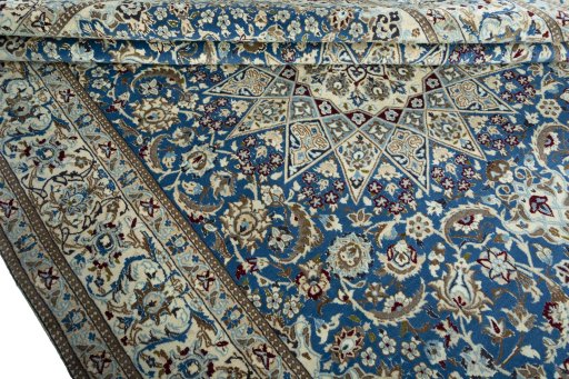 Close-up detail of 2000s Nain rug from Iran / Persia showing Wool weave