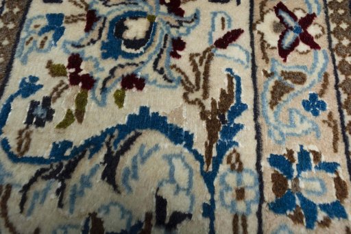 Close-up detail of 2000s Nain rug from Iran / Persia showing Wool weave
